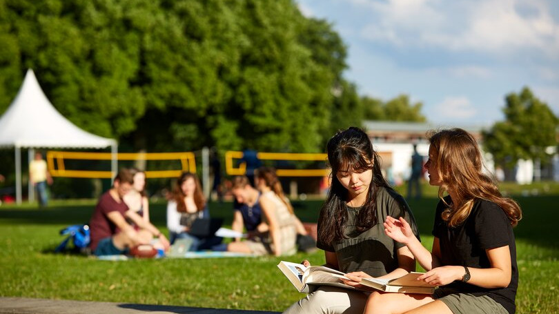 Students on the cafeteria lawn